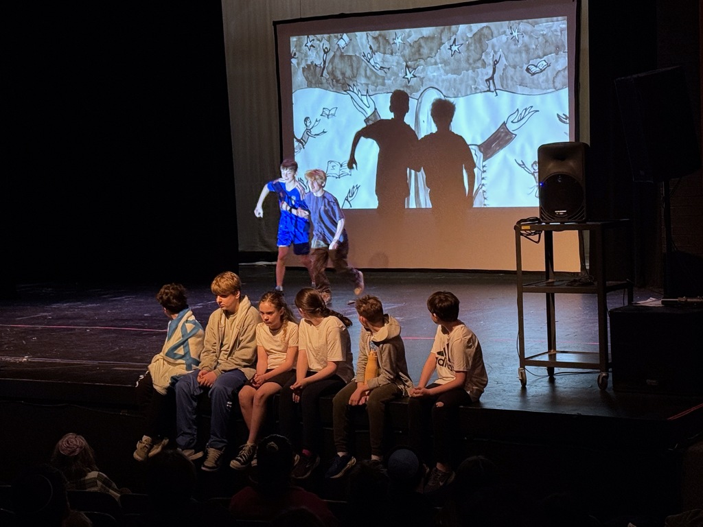 students perform skit to song