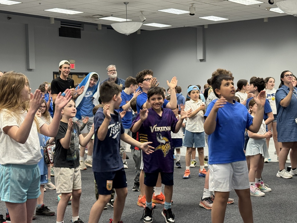students and teachers dance