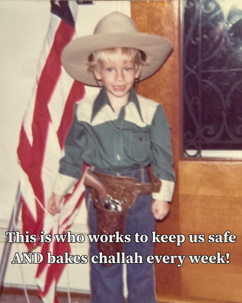 young boy in cowboy costume: this is who works to keep us safe AND bakes challah every week!