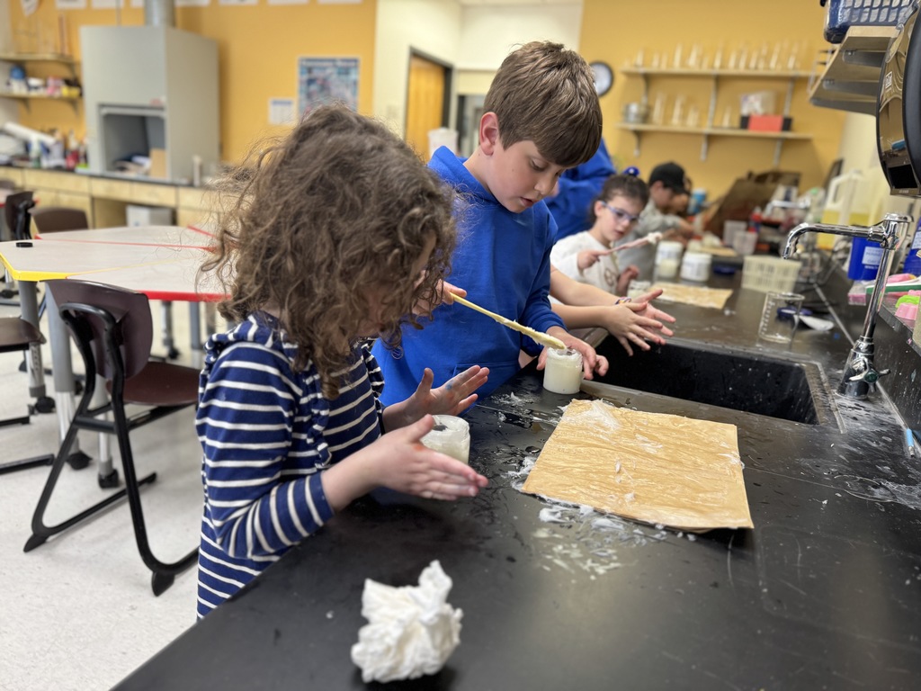 students mix water into ointment