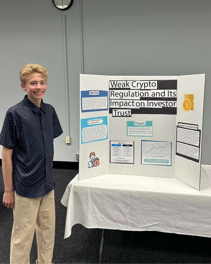 student with poster board