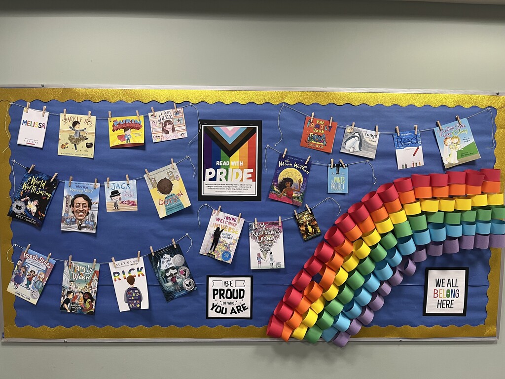Pride bulletin board with book covers