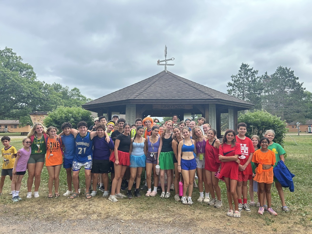 Dr. Dan and Ms. Ahlstrom with kids at Herzl Camp