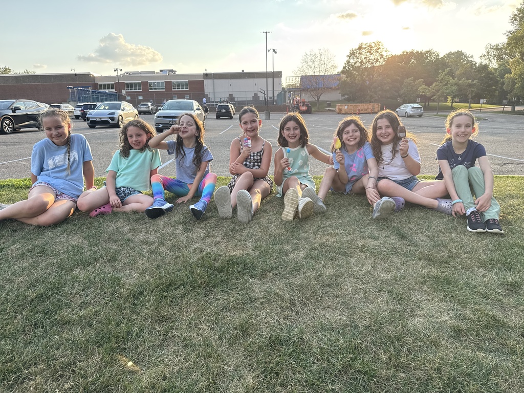 students sit and enjoy ice cream