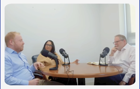Dylan Singer, Maayan Scholder, Jim Cohen around a table recording podcast