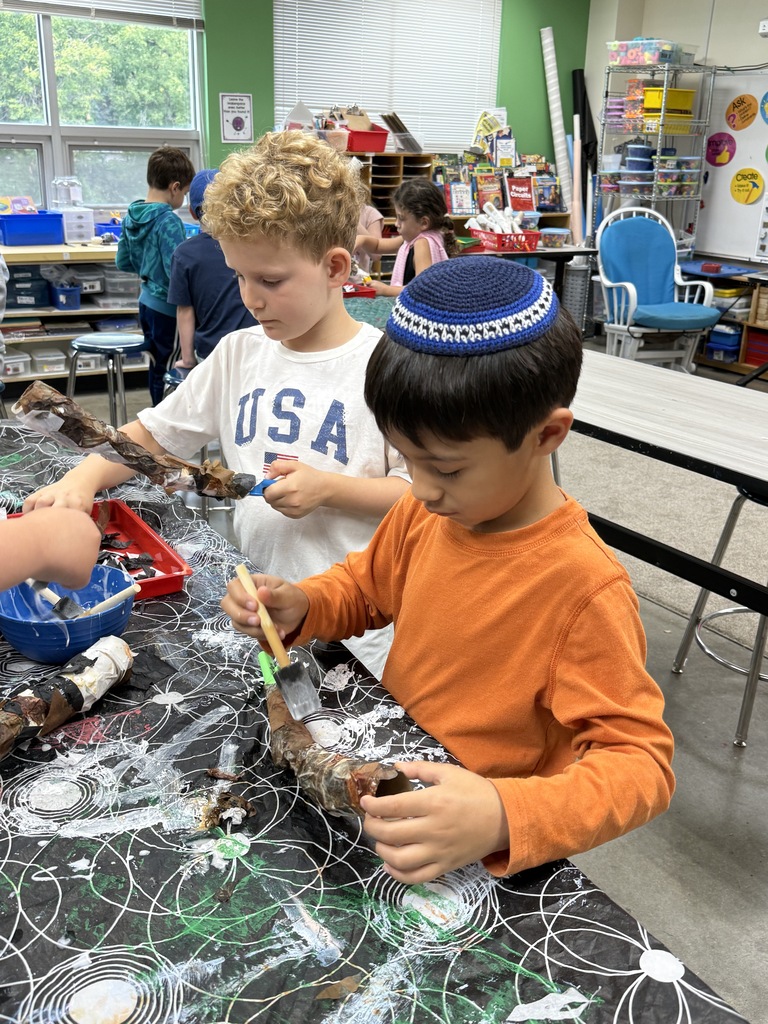 students make homemade kazoo/paper-mache shofars