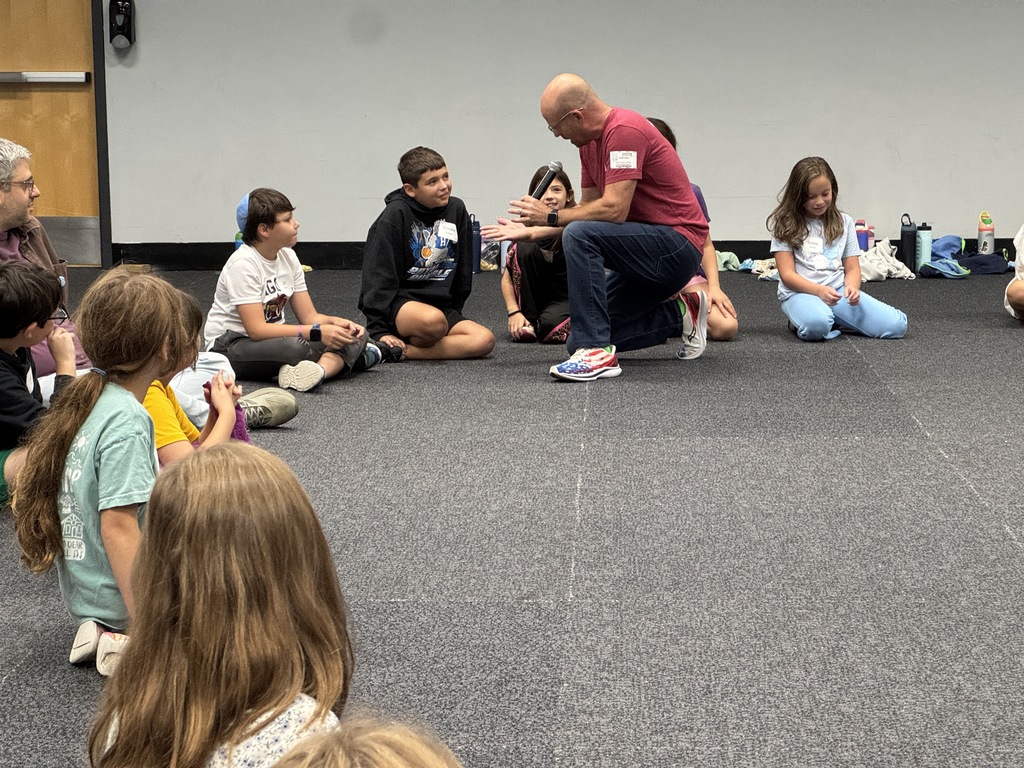 leader speaks to student