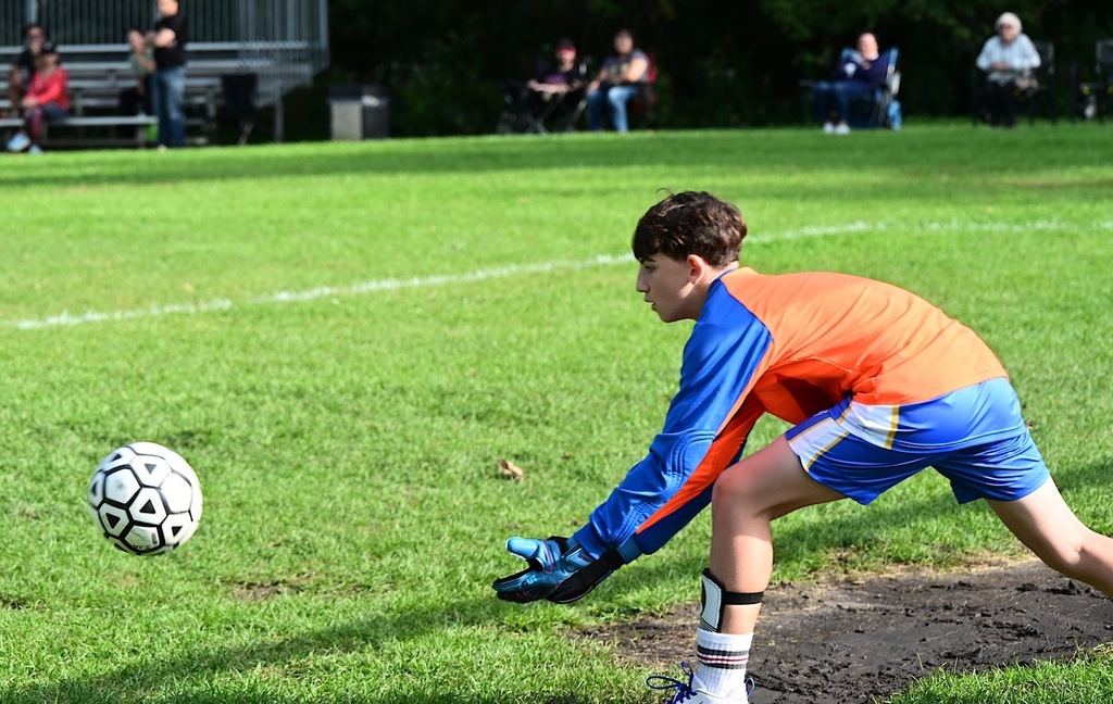 SJA Lions goalie scoops the ball
