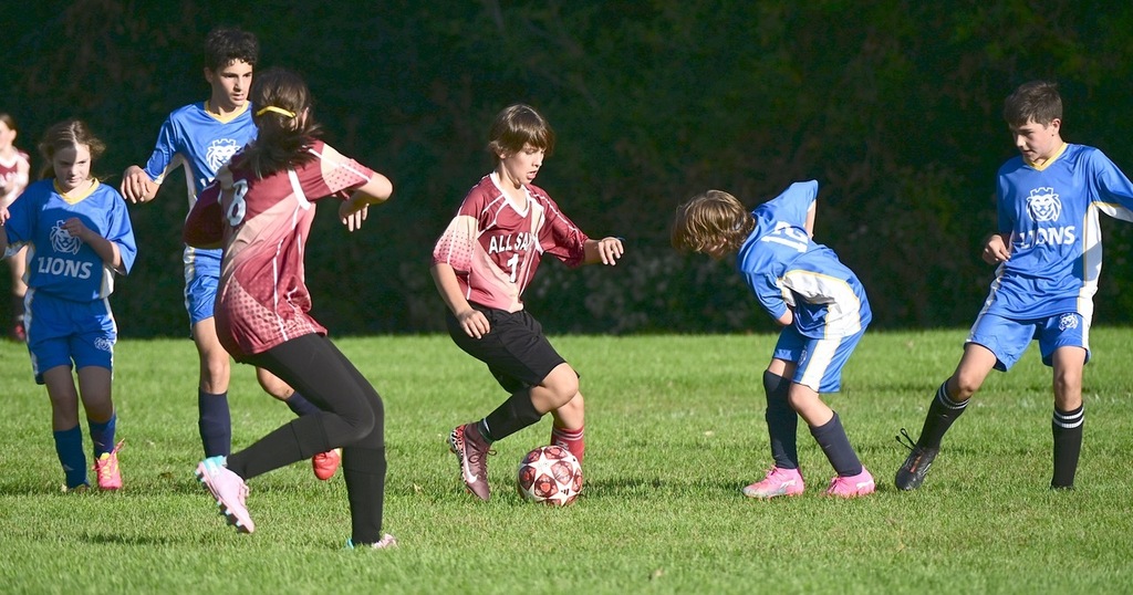 SJA Lions soccer team plays defense