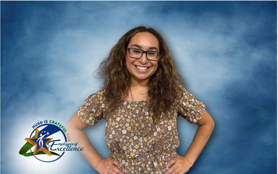 Smiling teacher at Diamond Valley