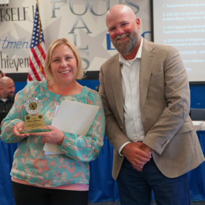 teacher winning an award
