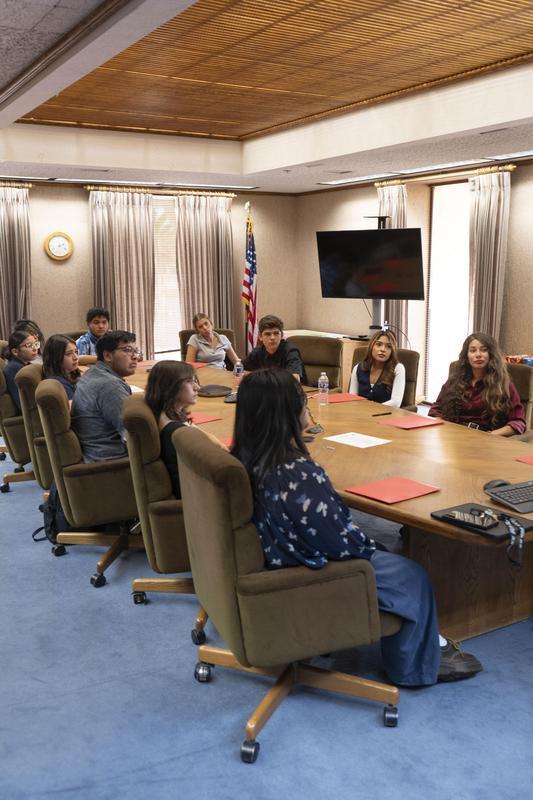 students andd teachers in a meeting