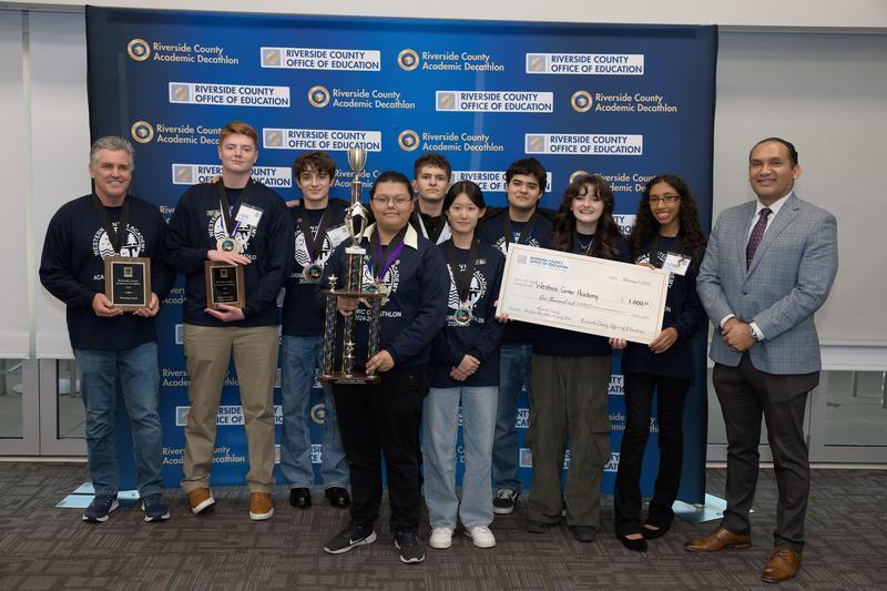 students and teachers getting an award