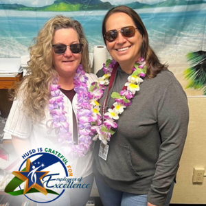 teachers smiling at the camera