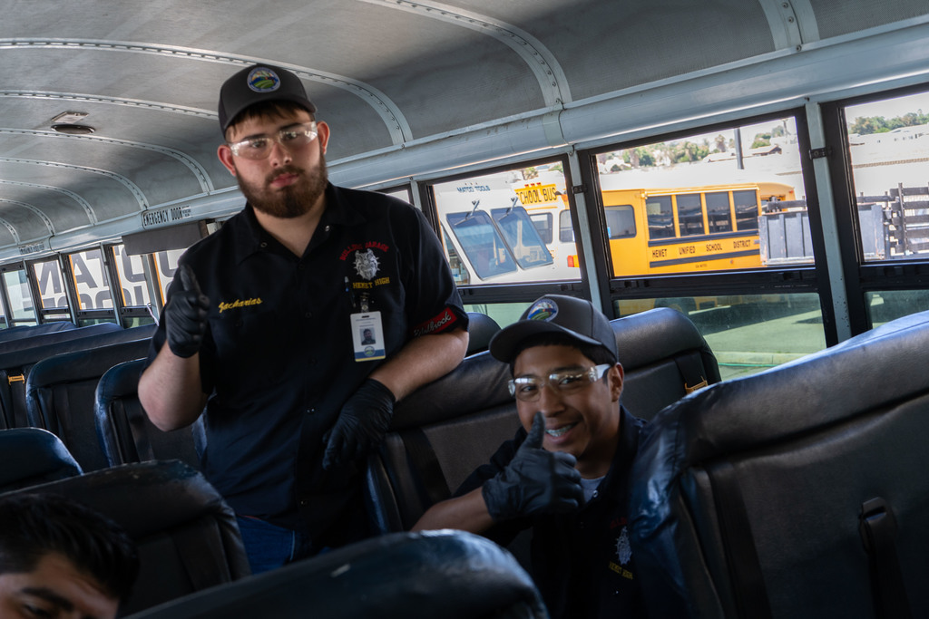 Student interns giving thumbs up