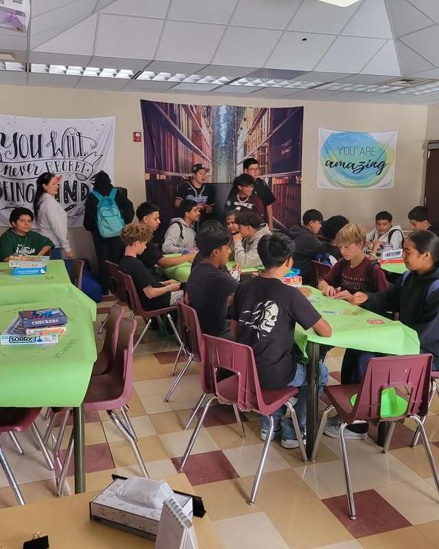 students sitting at tables