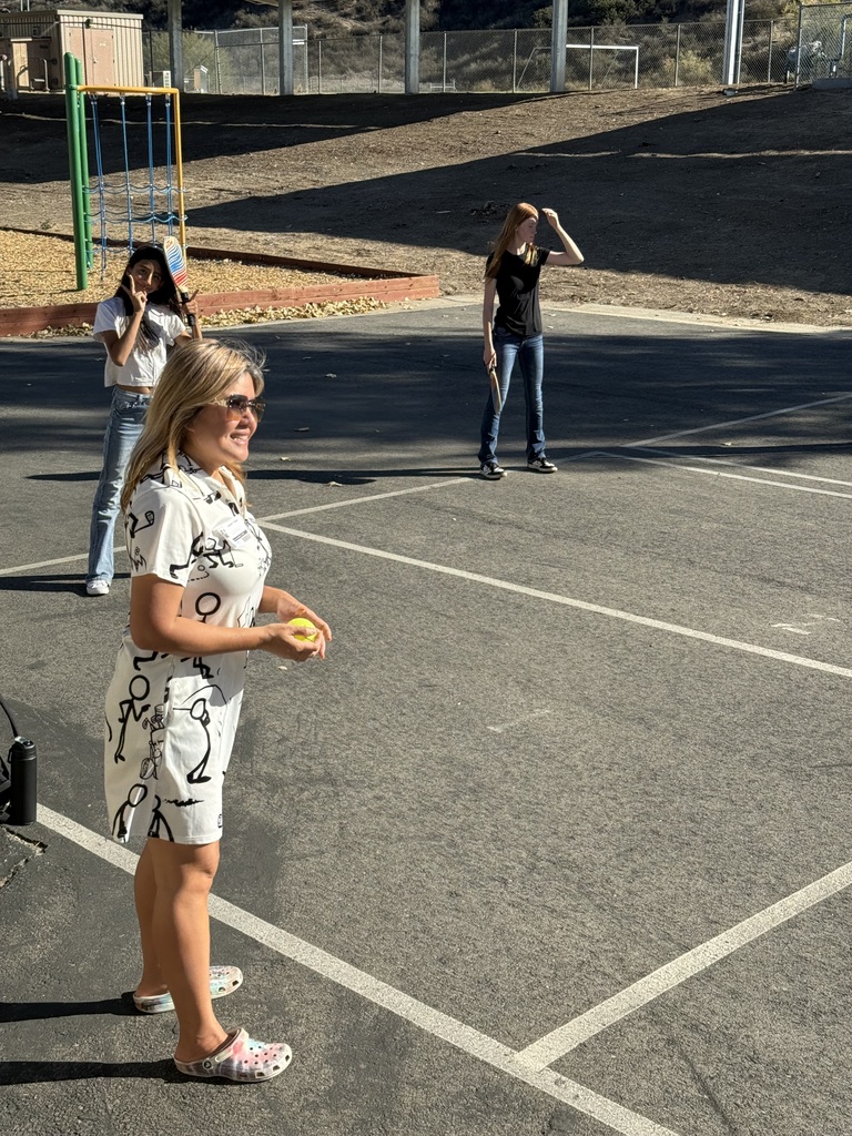 Ms. Tawny supporting Coach Kevin