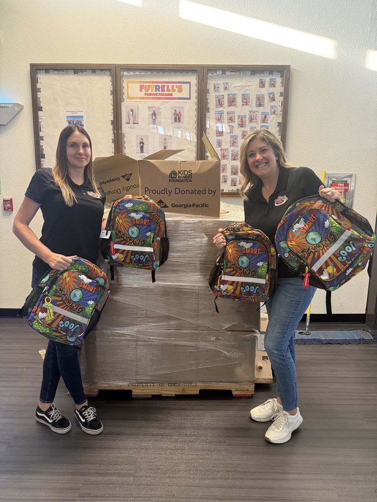 Fruitvale receiving backpacks for students.