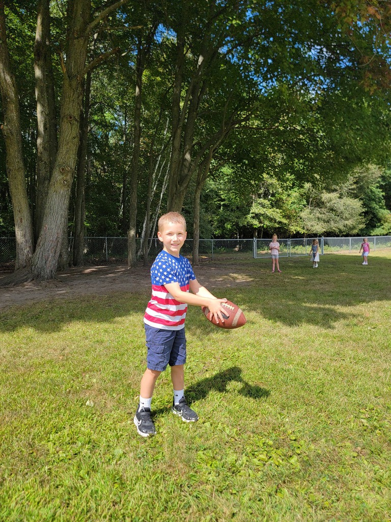 1st Grader playing football