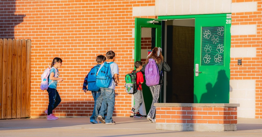 kids walking to building