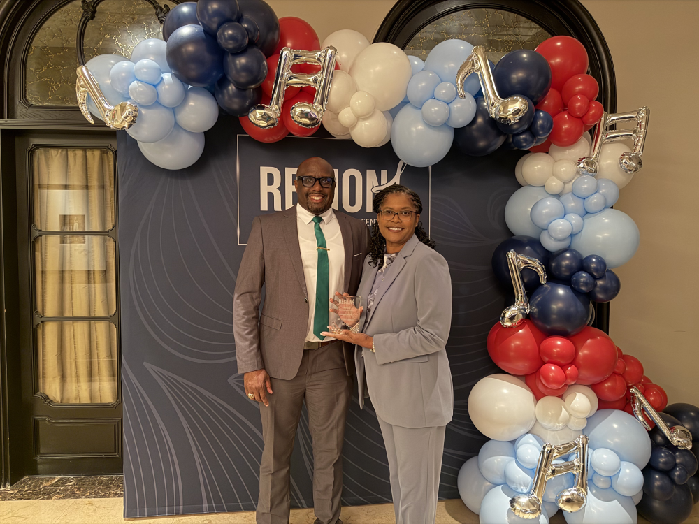 Region 4 Principal of the Year - Superintendent O'Neil and  HMS Principal Erika Douglas