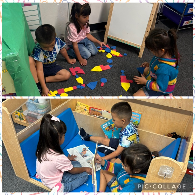 students reading and in blocks center