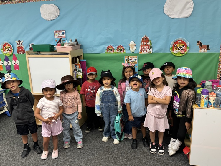 students with hats