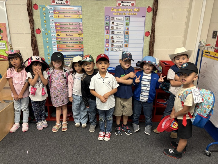 students with hats