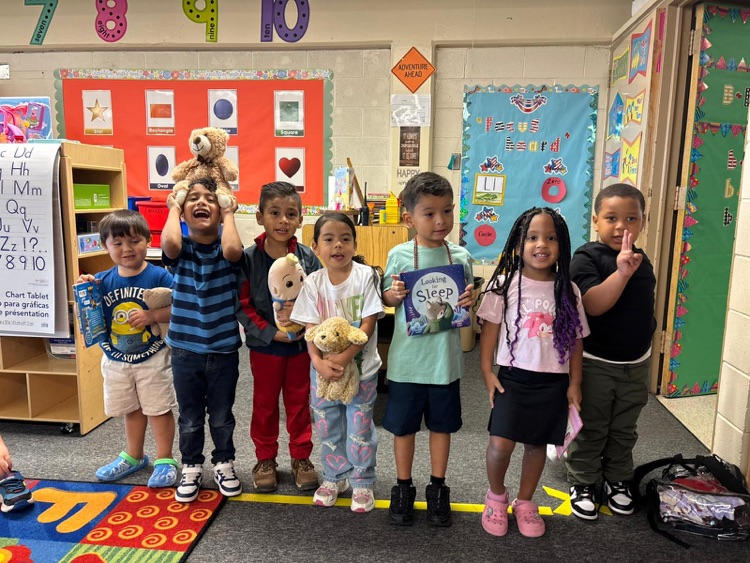 students with stuffed animals