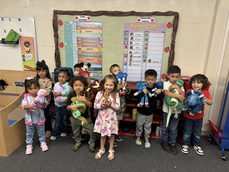 students with stuffed animals