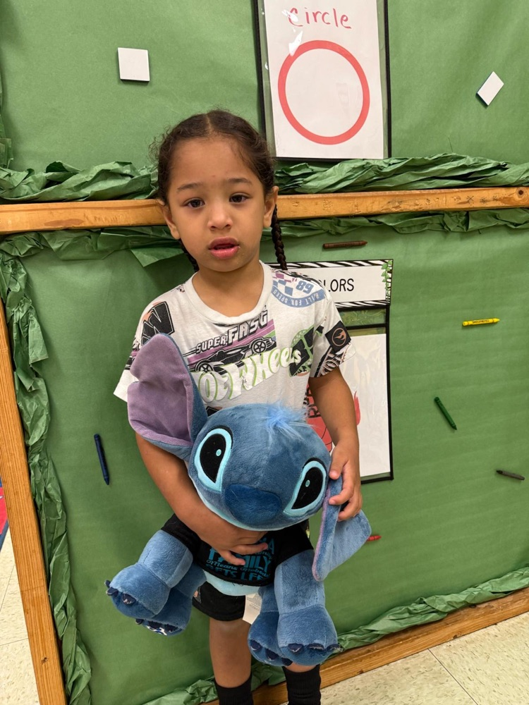 students with stuffed animals