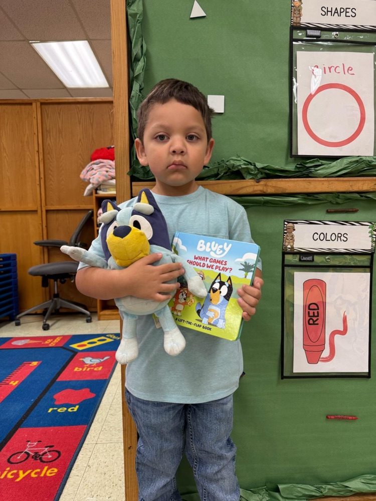 students with stuffed animals