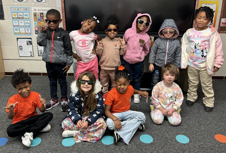 students in sunglasses or neon