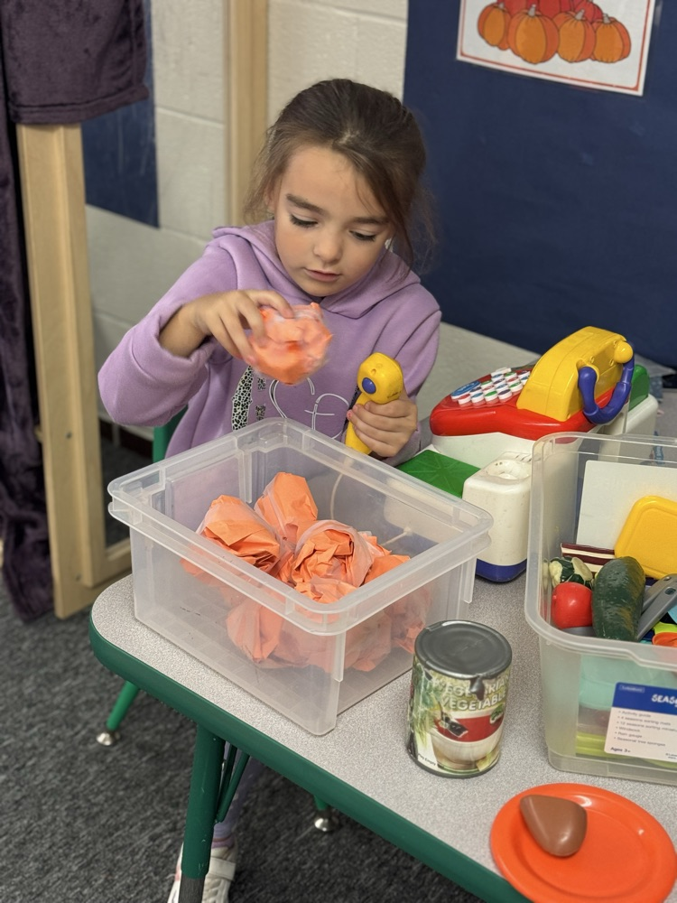 students playing in dramatic play
