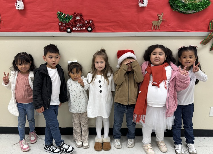 students with snowmen attire