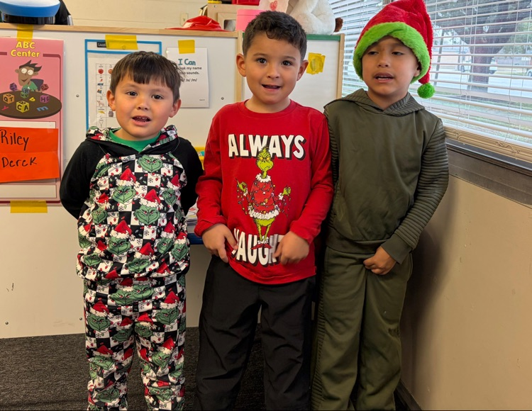 students in grinch attire