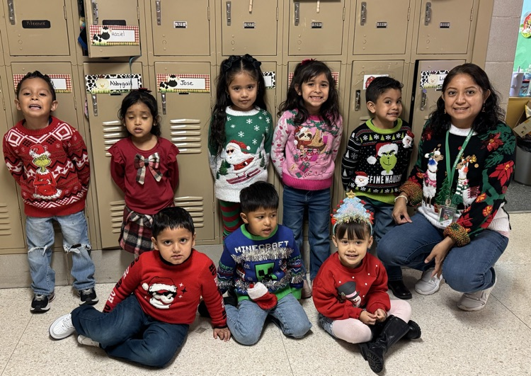 students in Christmas sweaters