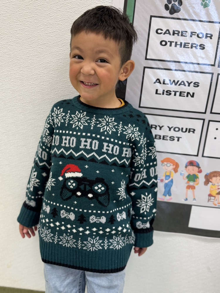 students in Christmas sweaters