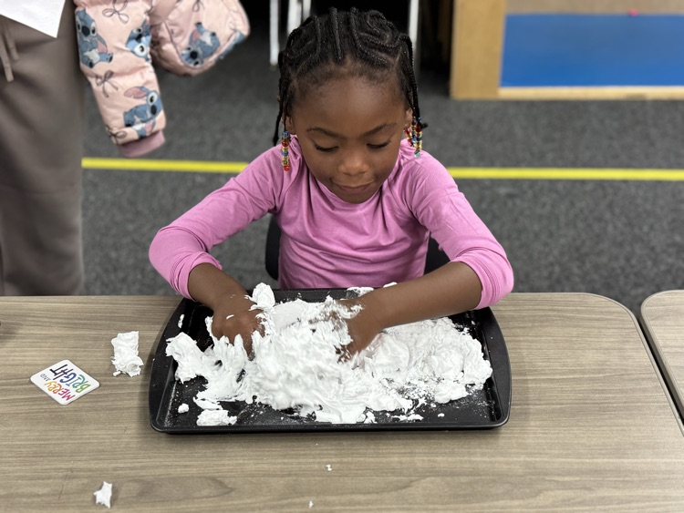 student making snow