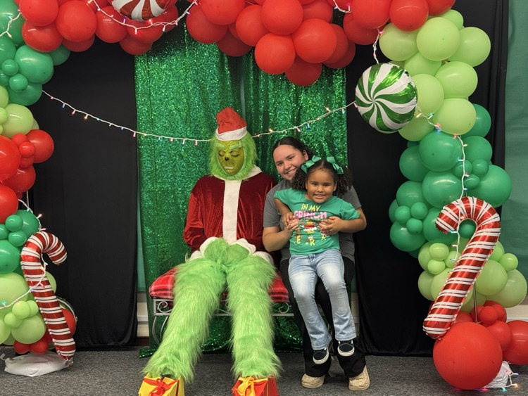 student with grinch