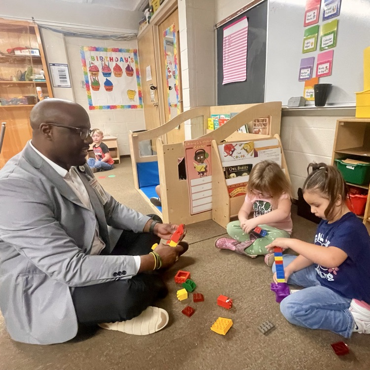 student and superintendent on first day back after winter break