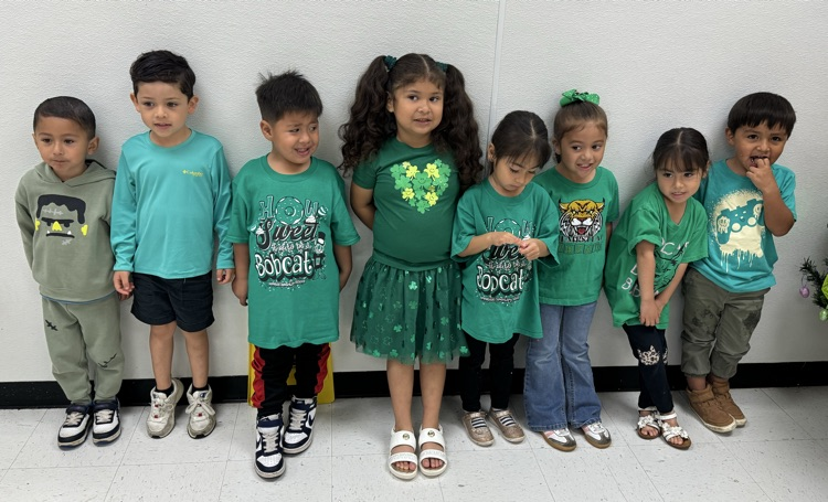 students in green