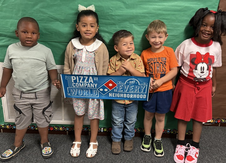 holding dominoes banner