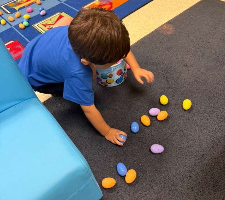 students hunting eggs