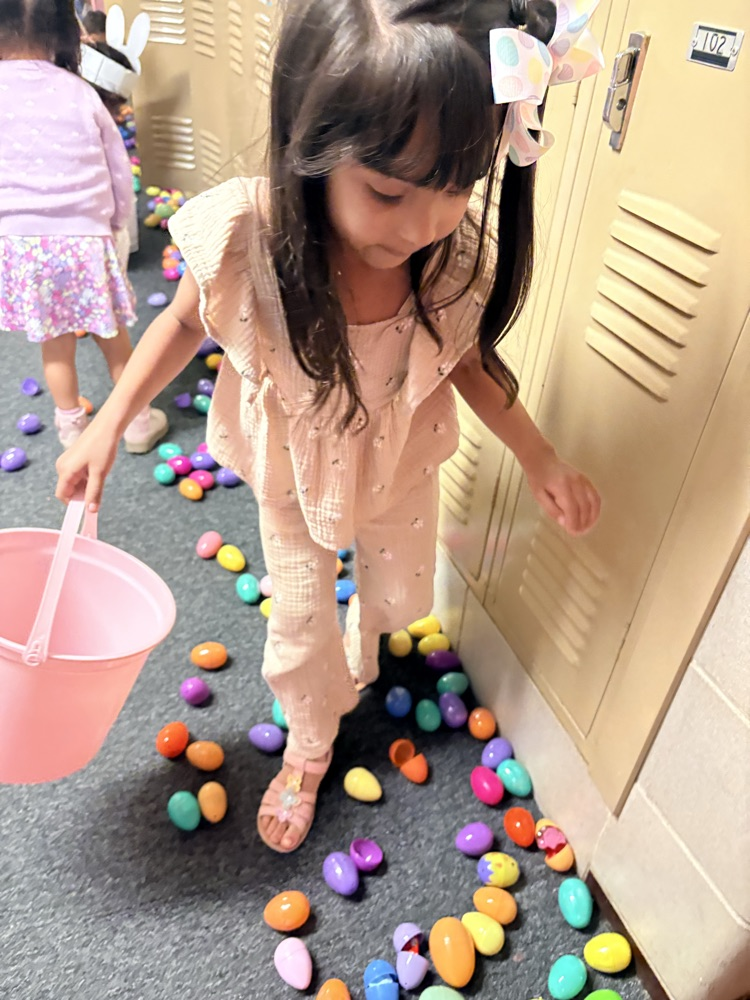 students hunting eggs