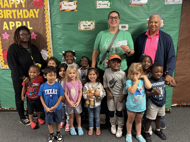 students smiling with donation