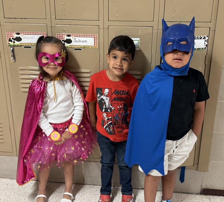 students in superhero shirts