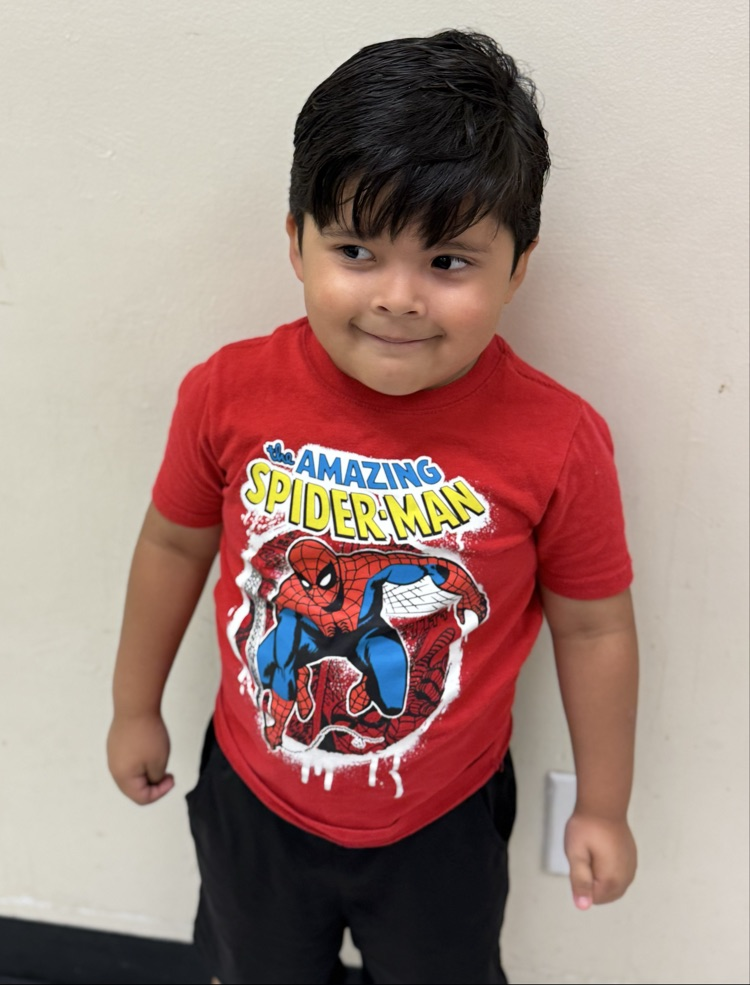 students in superhero shirts