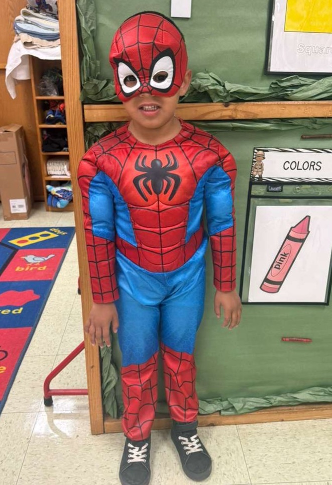 students in superhero shirts