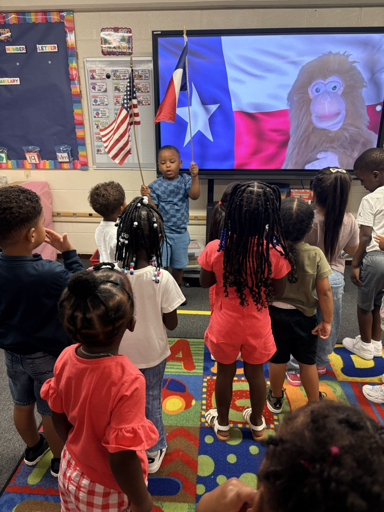 students doing the pledge